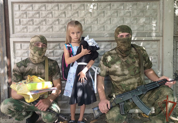 Росгвардейцы помогли подготовиться к школе детям в Запорожской и Херсонской областях (видео)